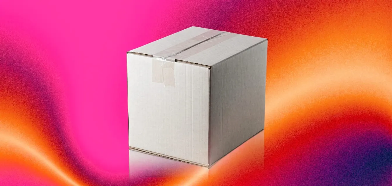 Product photo of a closed cardboard moving box on a hot pink, magenta and orange gradient